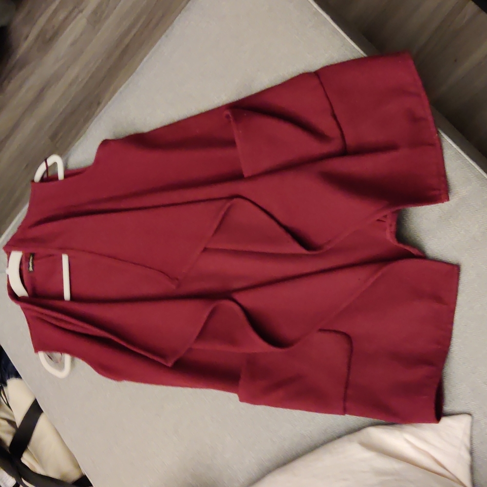 Long vest from Stradivarius. Color is darker than photos, more like second photo